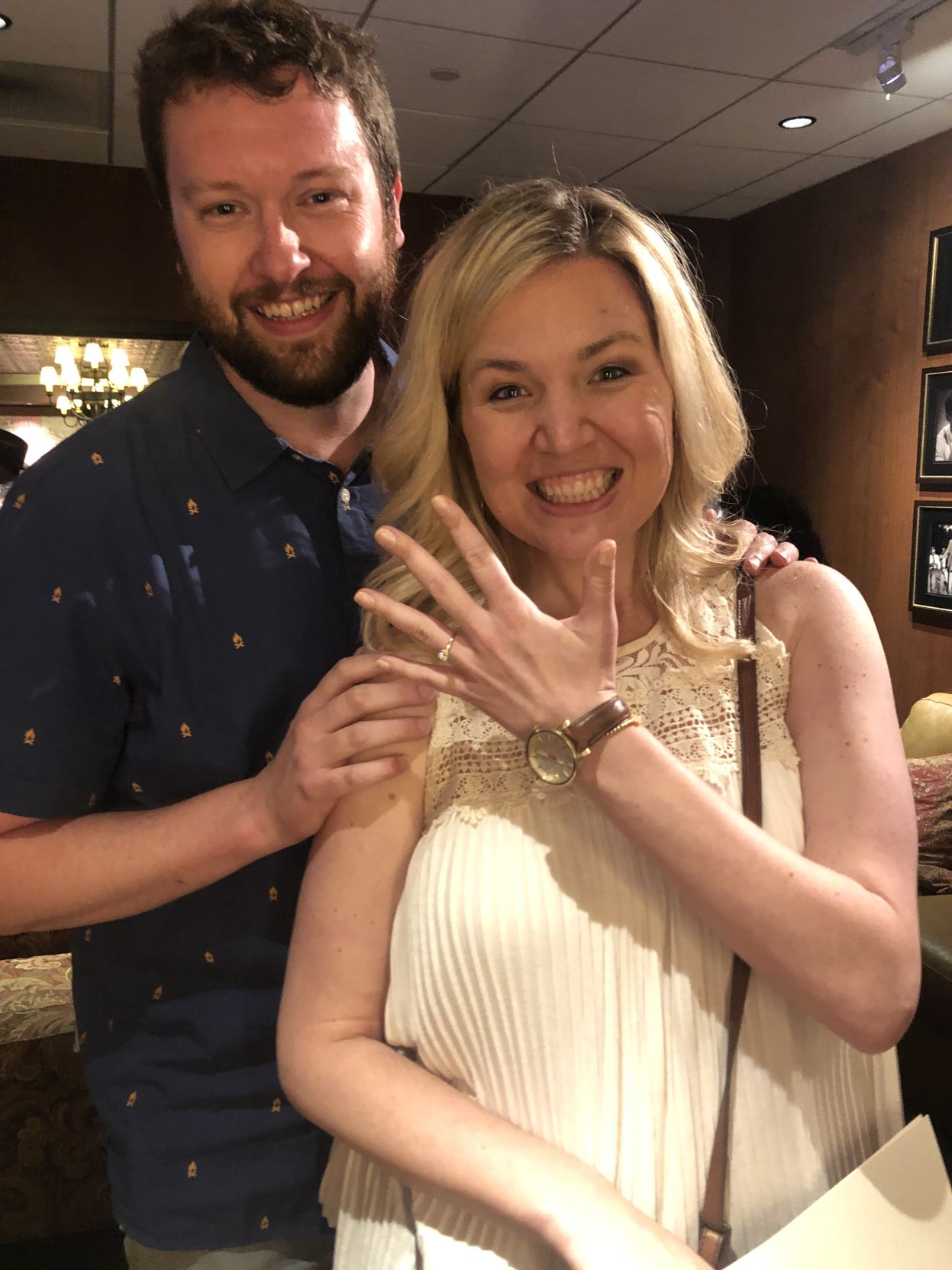 SECONDARY ART Engaged showing off ring.jpeg